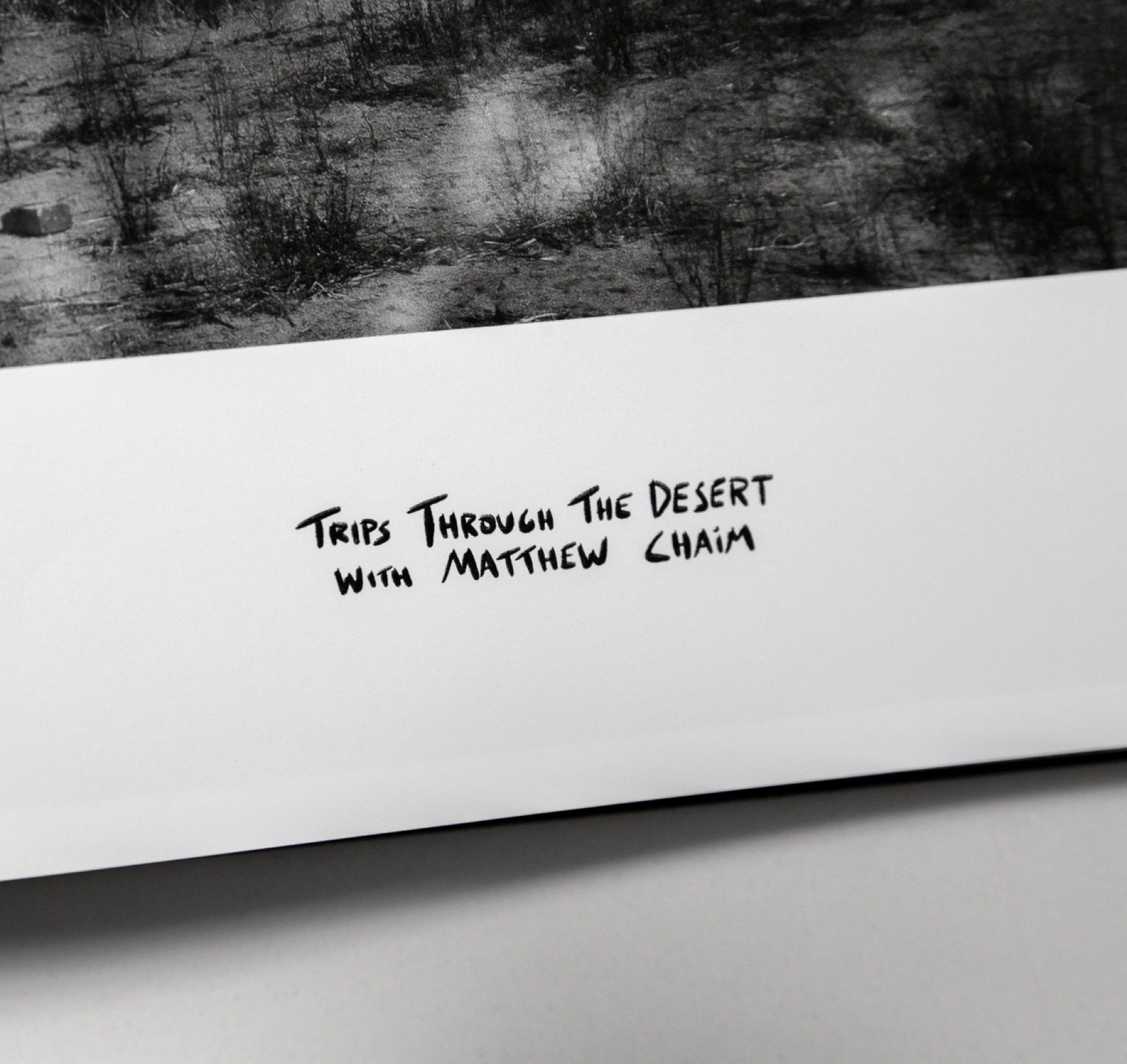 A handwritten chapter page in black ink
